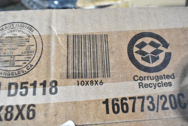 Cardboard box with barcode and recycling symbol, labeled 10x8x6. Contains 15 new items including Focus Bracket and Update Pastry Brush.