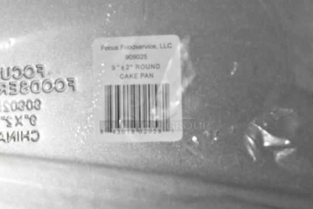5 new Focus 9"x2" round cake baking pans. Label indicates Focus Foodservice, model 909025.