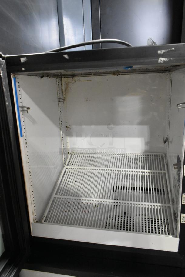 2023 True GDM-05-HC countertop display refrigerator, 24", metal, front access. Visible interior wear, 115V, 1 phase.