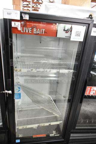 2023 True GDM-12-HC single door cooler, metal frame, poly-coated racks, 115V, 1 phase, "Live Bait" sign, excellent condition.