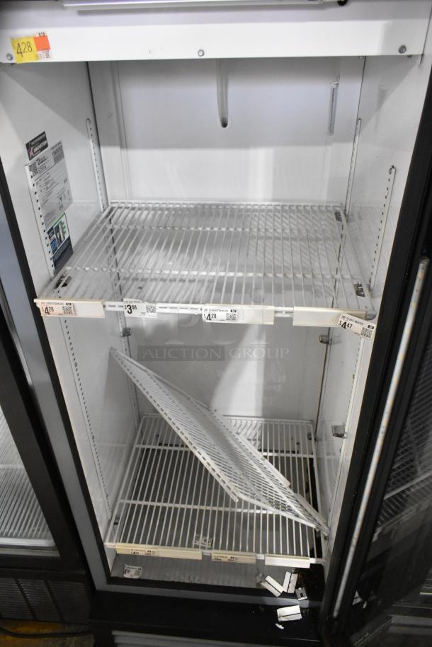 2023 True GDM-12-HC cooler, single door, metal, poly coated racks, 115V, visible tag, clean interior, slight wear.