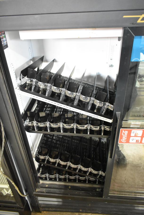 2016 True GDM-41SL-60-HC-LD commercial cooler, 2 glass doors, poly-coated racks, 115V, 1-phase, pristine condition.