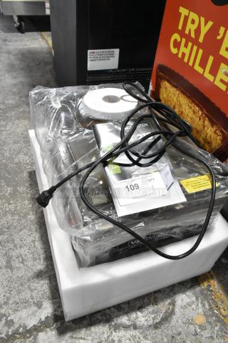 Vacmaster VP215 Stainless Steel Chamber Vacuum Sealer, new condition, 120 Volts, 1 Phase, with power cord and packaging display.