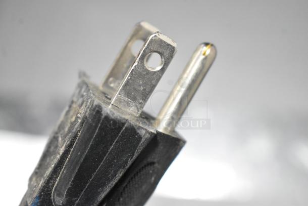 Close-up of a metal electrical plug for the 2019 IDW G-6-C234B cooler. 115 volts, 1 phase.