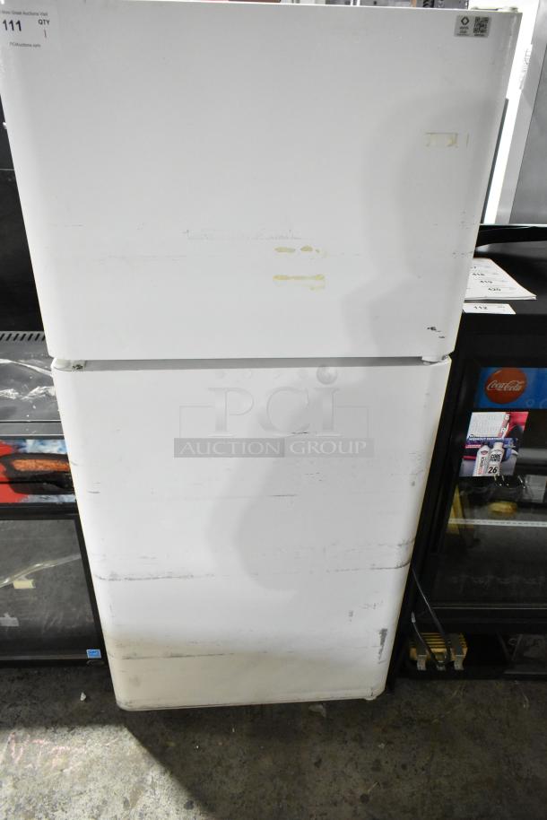 Electrolux FRT21IL6JW2 reach-in cooler with freezer, visible wear, 115 volts, 1 phase; auction lot 111.