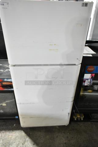 Electrolux FRT21IL6JW2 reach-in cooler with freezer, visible wear, 115 volts, 1 phase; auction lot 111.