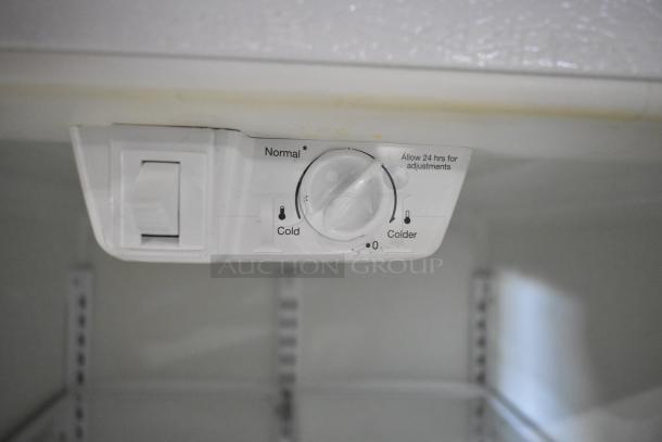 Electrolux FRT21IL6JW2 cooler and freezer thermostat, showing temperature control dial with settings from cold to colder.