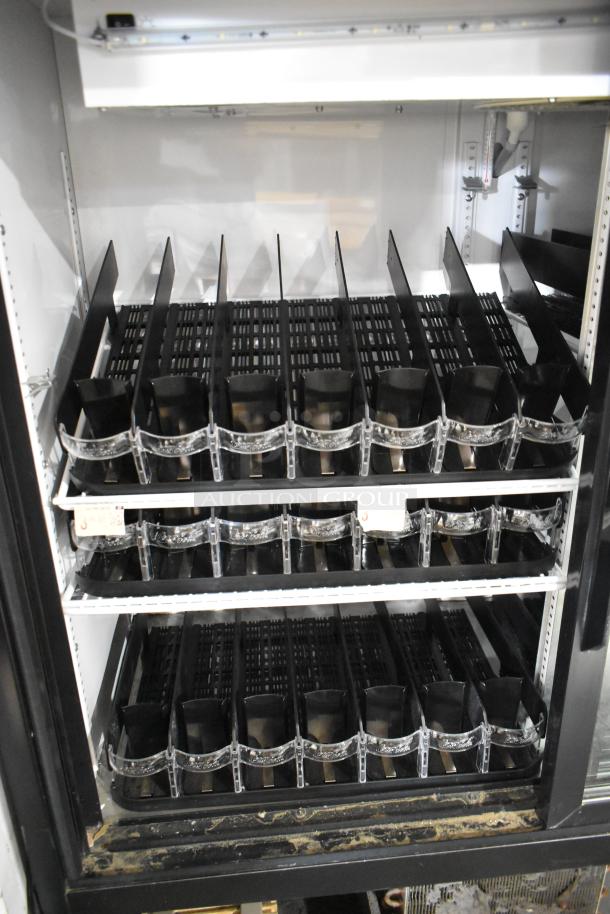 2017 True GDM-41SL-48-HC-LD 2-door cooler merchandiser, metal, poly-coated racks, 115V, clean condition.