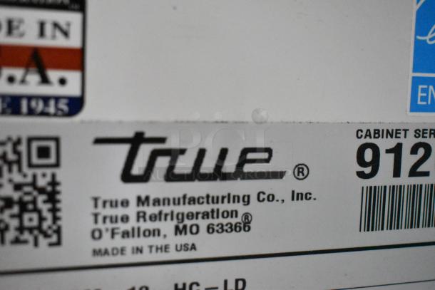 2017 True GDM-12-HC-LD cooler label showing brand, model, and origin details. Made in the USA.