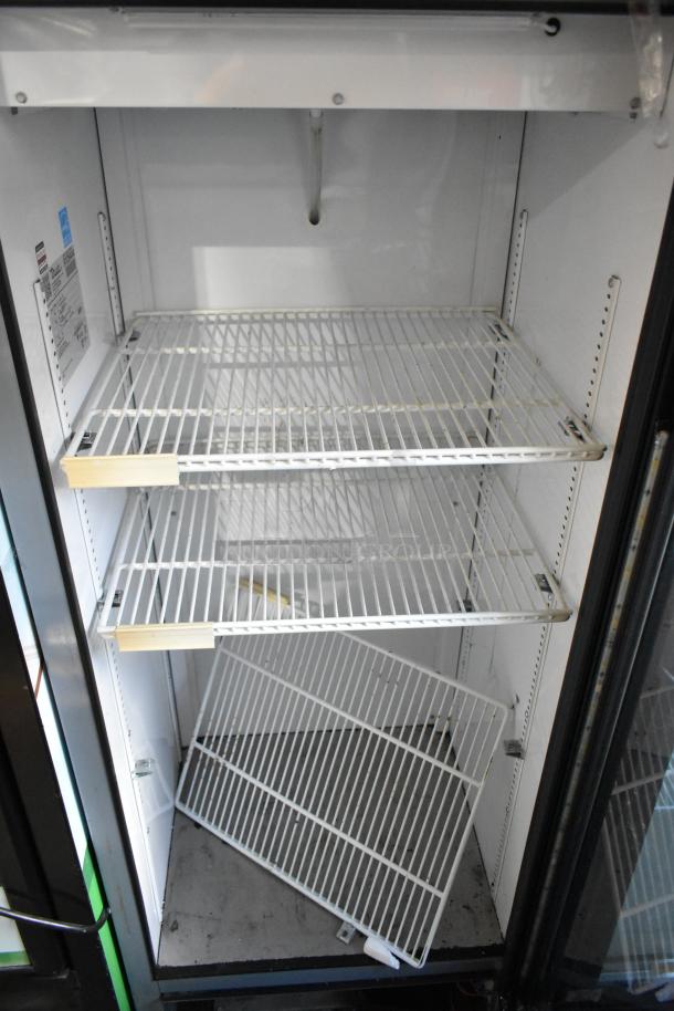 2017 True GDM-12-HC-LD single door cooler, metal build, poly-coated racks, 115V, 1 phase, clean interior, label visible.