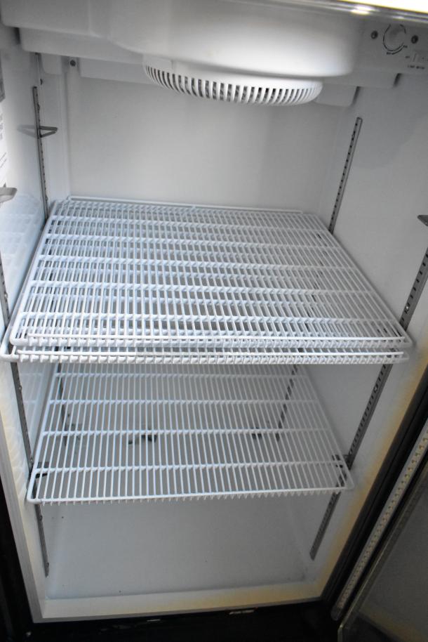 Hisense FL-35WC1H single door cooler with poly-coated racks, metal frame, 115 volts, 1 phase, excellent condition.
