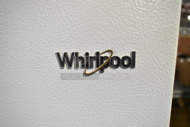 2022 Whirlpool WRT314TFDW03 cooler with freezer, 115 volts, 1 phase, logo detail on textured white surface.