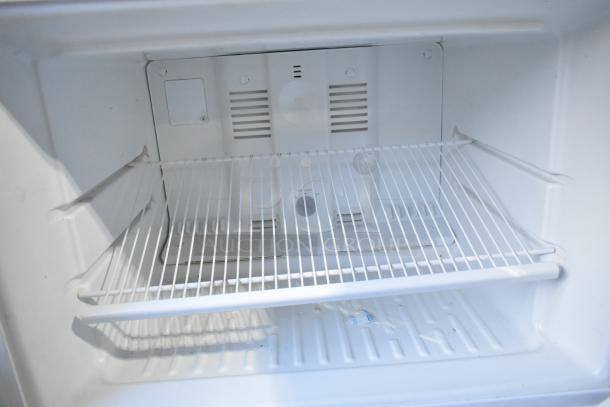 2022 Whirlpool WRT314TFDW03 reach-in cooler with freezer, white interior, wire shelf, 115V, 1 Phase, excellent condition.