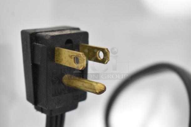 Close-up of power plug for 2022 Whirlpool WRT314TFDW03 Reach In Cooler, 115 volts, 1 phase.