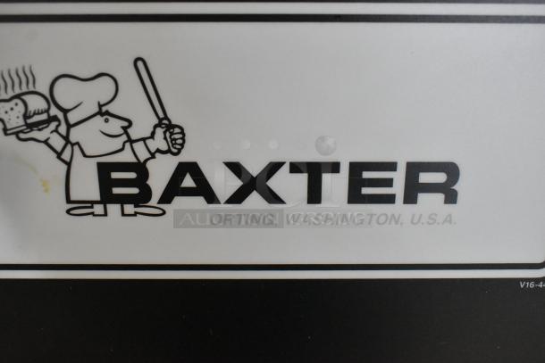 Baxter logo on a stainless steel roll-in rack proofer, Model PC151DD. 208/240 Volts, 1 Phase. Made in Orting, Washington, USA.