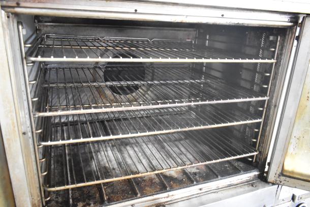 Blodgett EF-111 stainless steel commercial convection oven, view-through doors, metal racks, 480V, 3-phase, used condition.