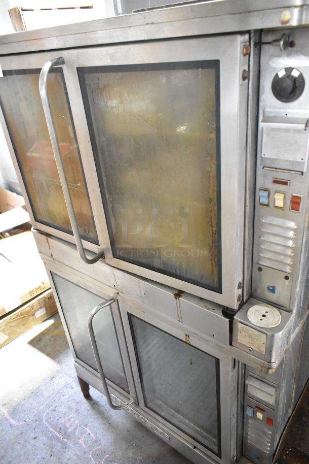 Blodgett EF-111 stainless steel commercial convection oven with view-through doors, metal racks, 440V, 3 phase, fair condition.