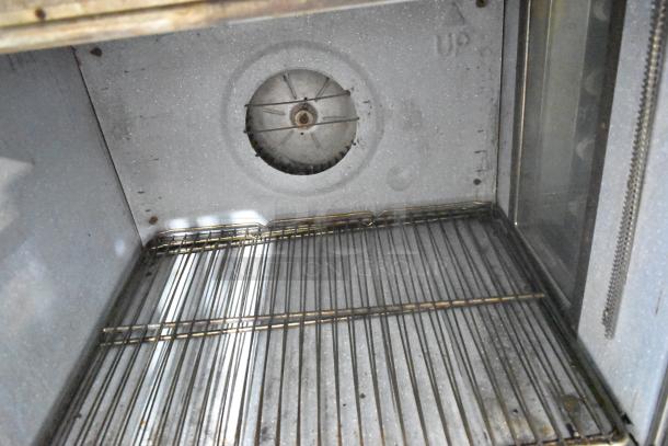 Blodgett EF-111 convection oven interior with metal racks, stainless steel, electric powered, 440V, 3 phase, view-through doors.