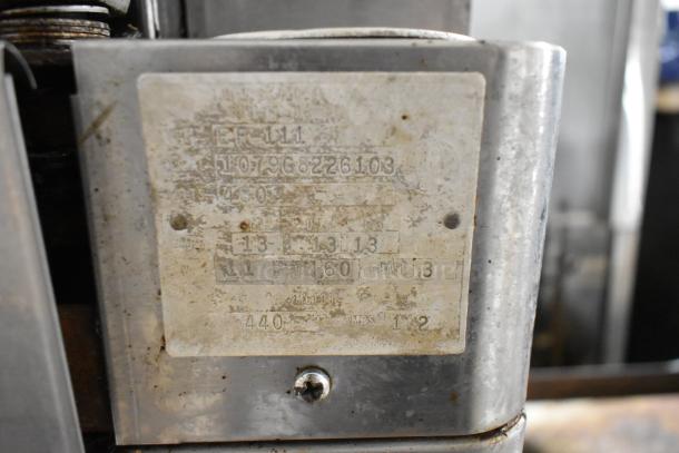 Blodgett EF-111 convection oven label showing model, 440 volts, 3 phase details on metal surface.