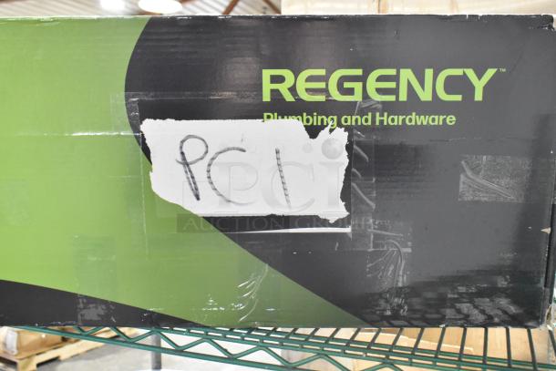 Box of Regency 600PRD4X pre-rinse faucet; 1.15 GPM, 4" centers, 44" hose. Marked “PCL.” New, scratch and dent condition.
