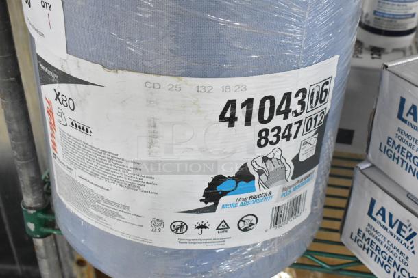 Kimberly Clark Wypall X80 roll of towels, model 4104306. New with scratch and dent. Packaged, visible labeling.