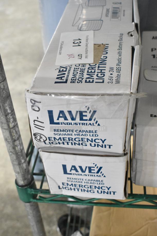 Lavex 695SQRRC Remote Capable Square Head LED Emergency Lights, new in box, with minor scratches and dents visible on packaging.