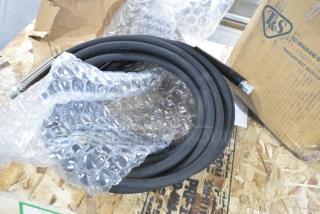 BRAND NEW scratch and dent cable, partially unpacked, wrapped in bubble wrap, connectors visible, branded box nearby.