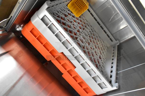 Brand new 2025 Mainstreet 541HTUC30 stainless steel high-temp undercounter dishwasher with orange tray insert.