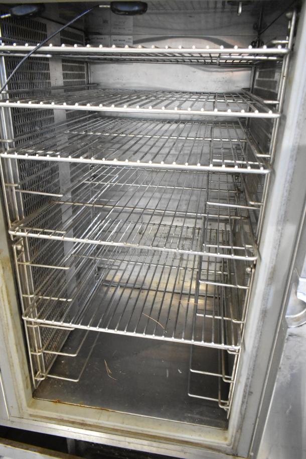 2023 Alto Shaam QC2-40 Stainless Steel Commercial Quickchiller, interior view with multiple wire racks, clean and well-maintained.
