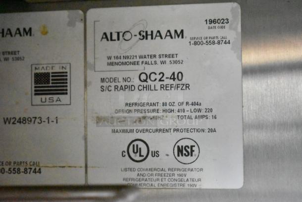 "2023 Alto Shaam QC2-40 commercial blast chiller label; stainless steel, uses R-404a refrigerant, UL and NSF certified."