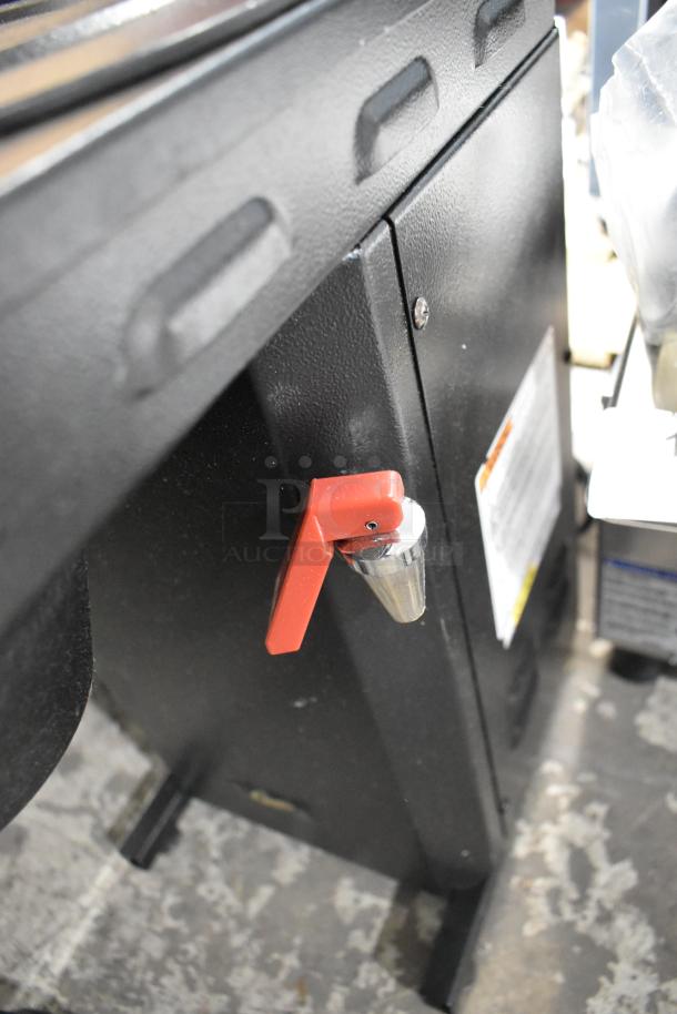 Curtis TLP 18" Automatic Airpot Brewer, black finish, visible red lever, brand new with minor scratches, 120V, 1 phase.
