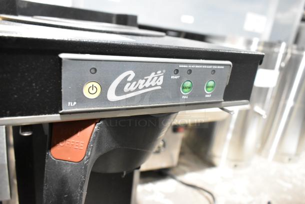 Curtis TLP Low Profile 18" Automatic Airpot Brewer, black finish, 120 volts, brand new with minor scratches, brew control panel visible.
