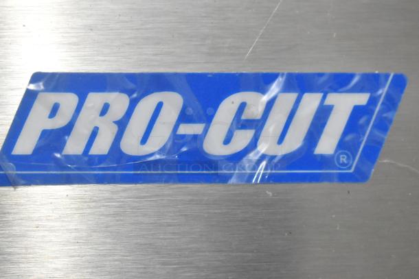 Pro-Cut KG-12-SS electric meat grinder logo, stainless steel finish, 115 volts, new with minor scratches and dents.