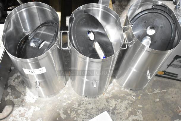 Three Bunn 34100.0002 TDO-4 4-gallon iced tea dispensers with brew-through lids are shown. New with minor dents.