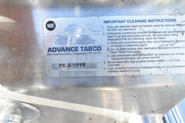 Advance Tabco FC-3-1818 stainless steel commercial sink label showing model and cleaning instructions.