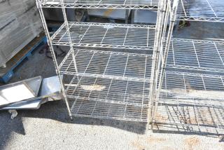 Chrome finish 6-tier wire shelving unit, sturdy design, used condition, buyer must dismantle, freight charges apply.