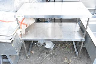 Regency 600DOS1836 stainless steel 2-tier over shelf in used condition, visible Regency and NSF labels, sturdy construction.