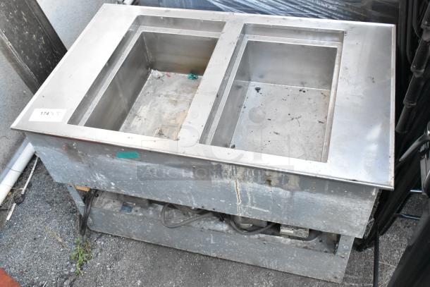 Vollrath Stainless Steel 2 Well Drop In, dual compartments, visible wear, includes control components, tag number 174.