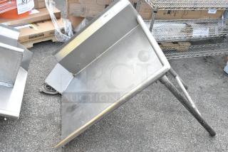 Stainless steel right side clean side dishtable, gently used, with sturdy legs and slight surface wear, ideal for kitchens.