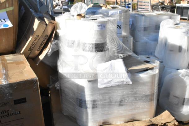 Pallet lot of Clark PERF Printed RS 420mm rolls, new scratch and dent condition, wrapped in plastic, various boxes visible.