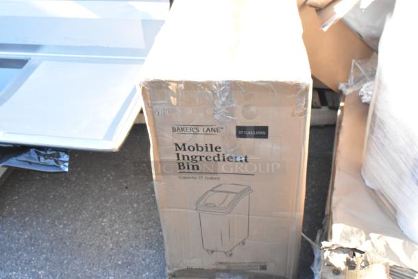Brand new Bakers Lane 27 Gallon Mobile Ingredient Bin in box, scratch and dent condition, labeled for capacity and mobility.