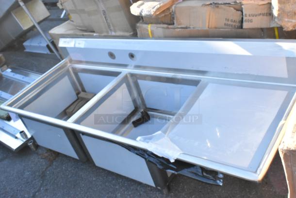 BRAND NEW Regency 600S2242424R Stainless Steel 2 Bay Sink, right side drain board, no legs, minor scratches, no dents.