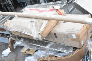 Five brand new scratch and dent items including a trash can and wire shelf, in original packaging, minor box damage.