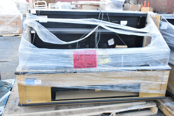 Hussmann Q3-SS-6S Grab N Go Merchandiser, metal, 208/240V, 1 phase, wrapped for shipping, visible shipment label.