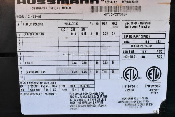 Hussmann Q3-SS-6S Merchandiser label with voltage, phase, and refrigerant details. Suitable for commercial use.