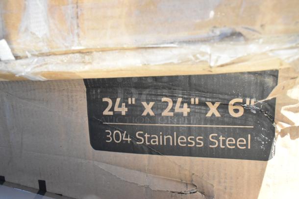Cardboard box labeled "24'' x 24'' x 6'', 304 Stainless Steel," indicating size and material details.