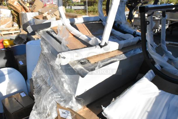 10 new scratch and dent items, including chair frame, mop sink, dish table. Sold together, packaging visible.