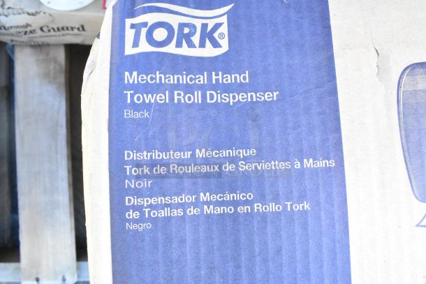 Tork Mechanical Hand Towel Roll Dispenser box, labeled "Black." Item appears new; part of 7-item auction lot.
