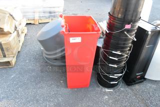 Red poly trash can, rectangular, sturdy construction, in good condition, with a white label marked "210."