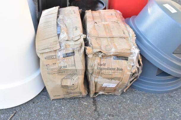 Two Baker's Lane 6.3-gallon ingredient bins with flip lids, new but in damaged packaging. Includes label sheet and scoop.